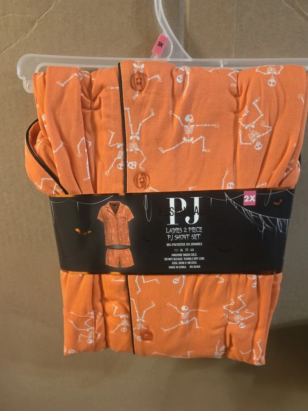 Essentials Women's Orange Short 2-Piece Pajama Set with White Skeleton Print